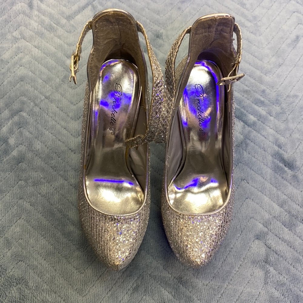 Previously loved silver high heels